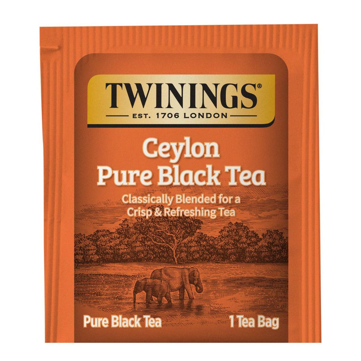Orange Twinings Ceylon Pure Black Tea package with an illustration of elephants and a scenic landscape.
