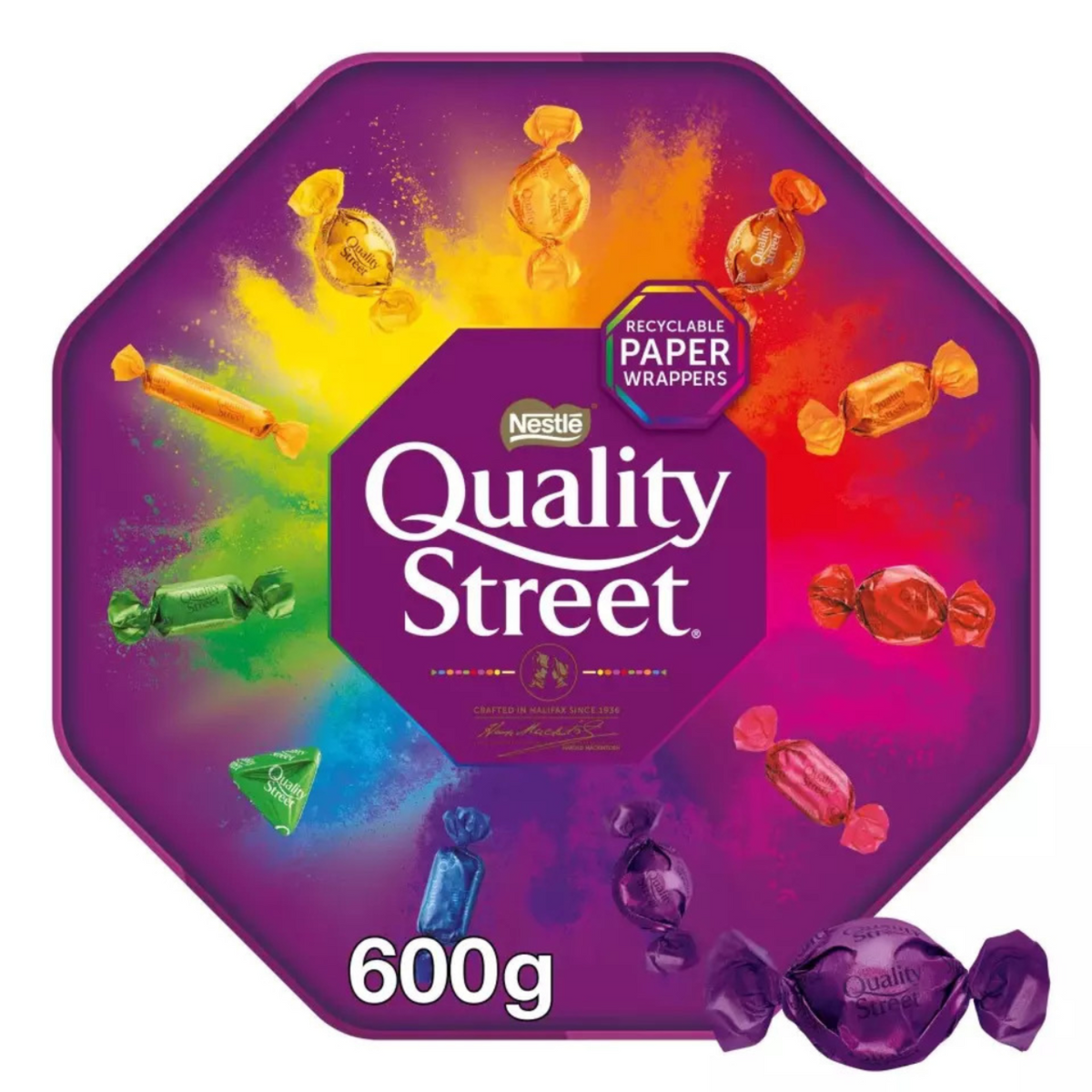 Quality Street chocolate tin with colorful candy design on a white background