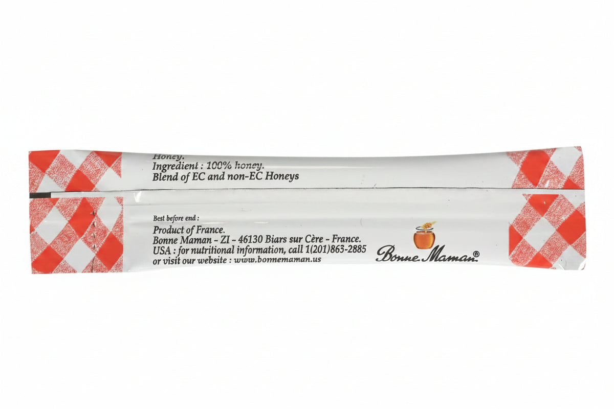 Honey package with red and white checkered design on a white background