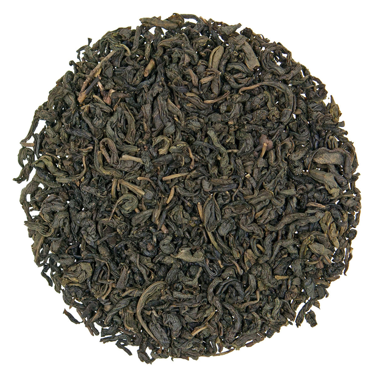 Dry organic green tea leaves in a circle pattern on a white background.