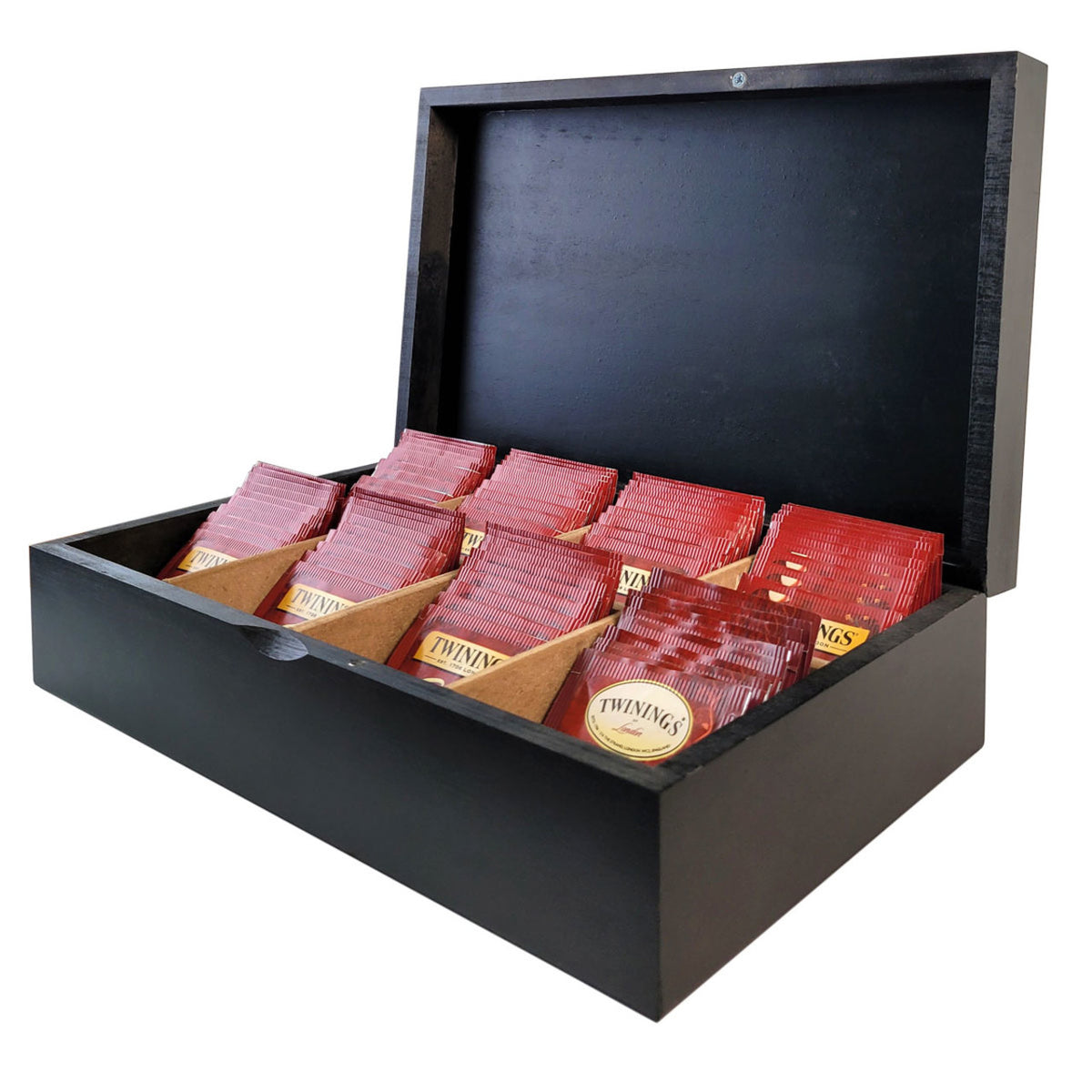 Black display case with red and gold tea bag packages inside