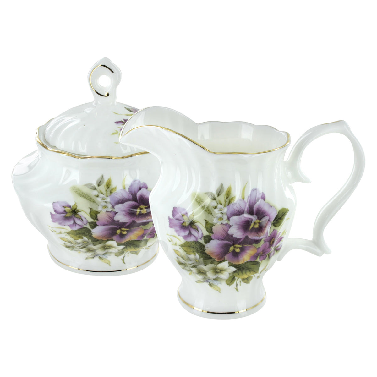 Tea set with floral design on a white background