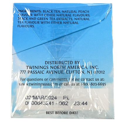 Tea package with blue background and white text displaying ingredients and contact information.