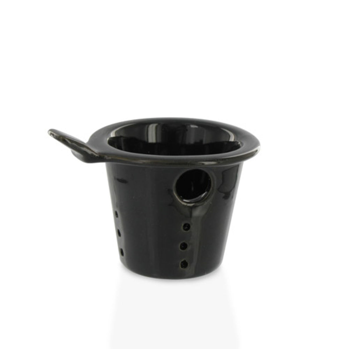 Black ceramic teapot infuser with drainage holes on a white background