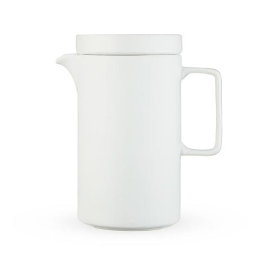 White ceramic pitcher on a white background