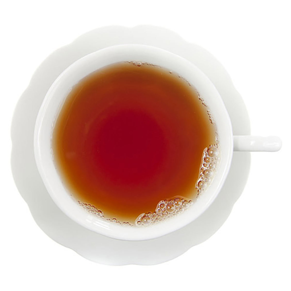 White cup with a dark amber hot tea on a white background
