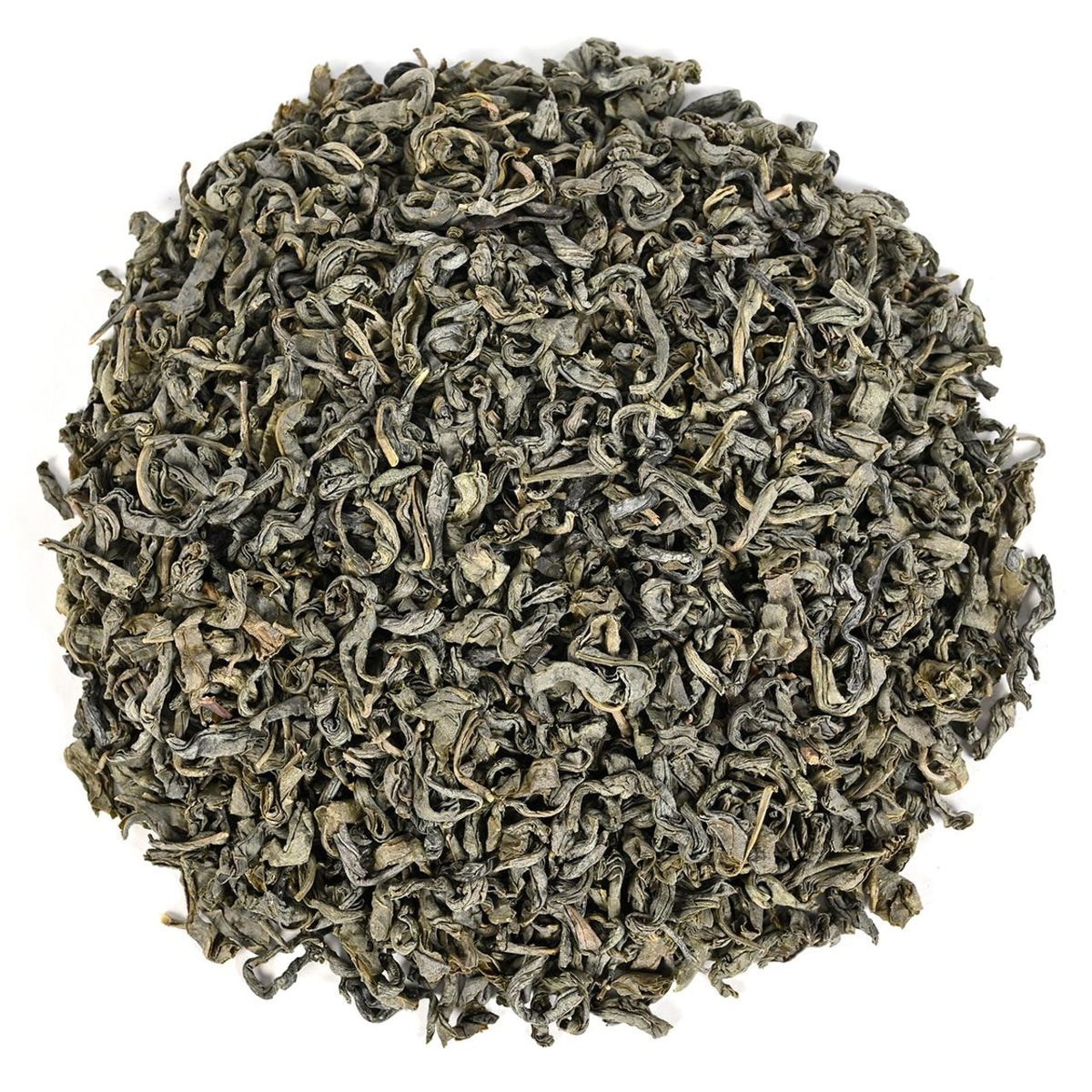 Close-up of loose-leaf green tea on a white background