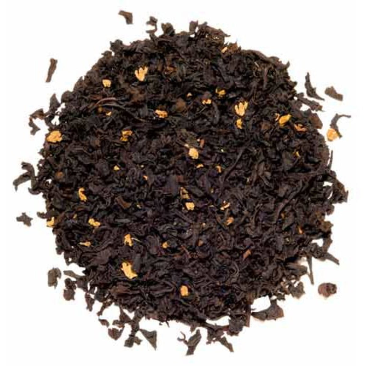 Close-up of black tea leaves on a white background