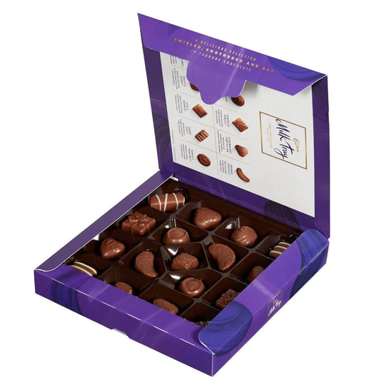 Cadbury Milk Tray chocolate box with purple design and gold text opened to show individual pieces of chocolate.