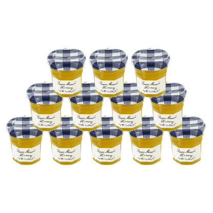 12 1oz jars of Bonne Maman Honey with a checkered lid on a white background