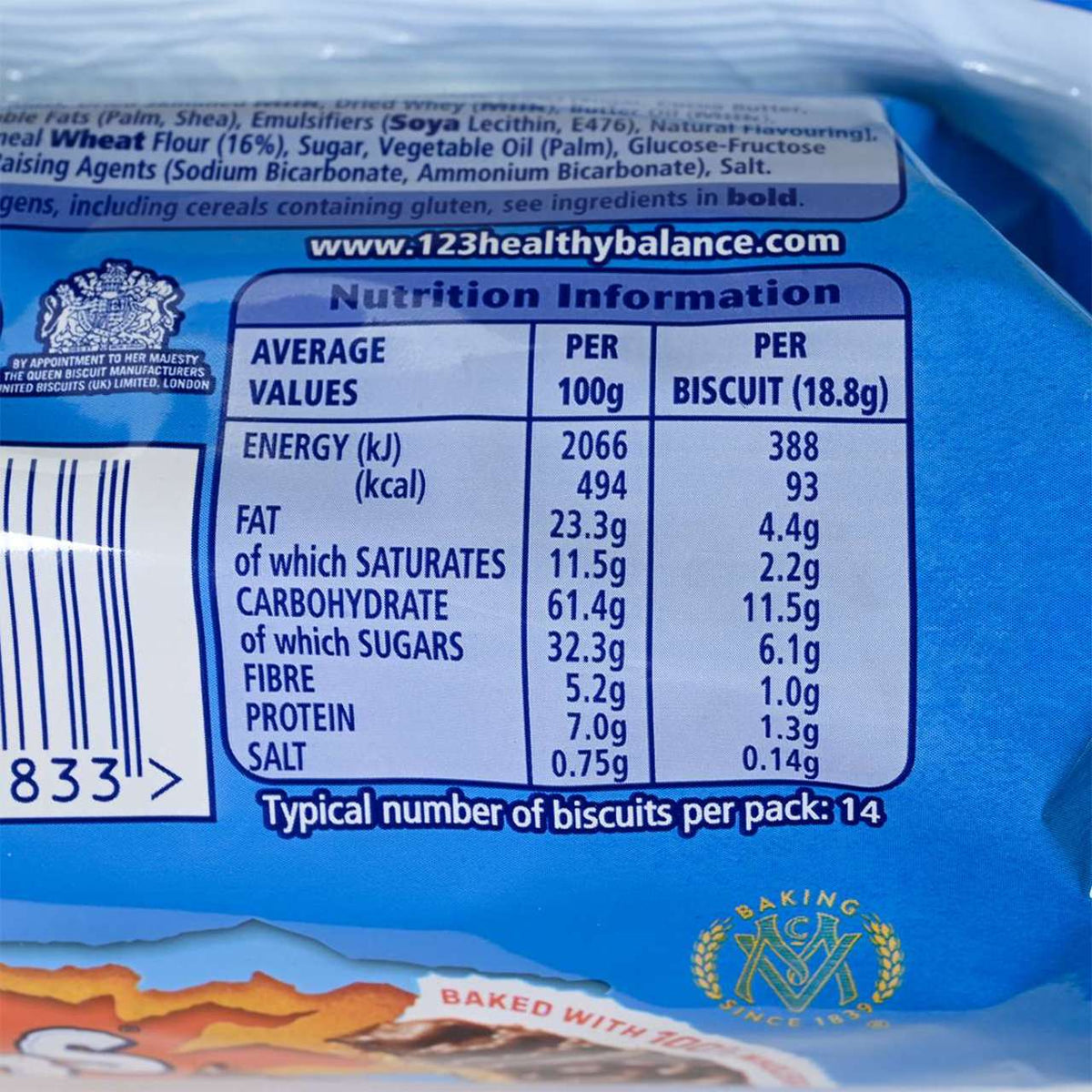 Close up for the nutritional information label on a blue package of McVitie's Milk Chocolate Hobnobs.