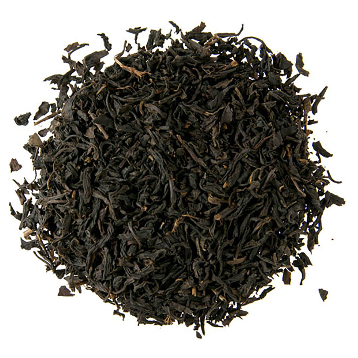 A close-up of dry black tea leaves with pieces of lychee fruit included, against a white background.