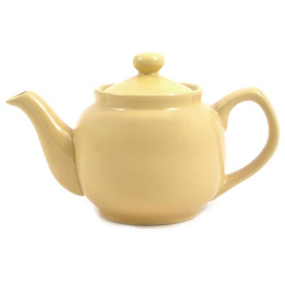 A beige ceramic teapot with a lid, spout, and handle.