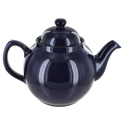 Navy blue teapot on a white background