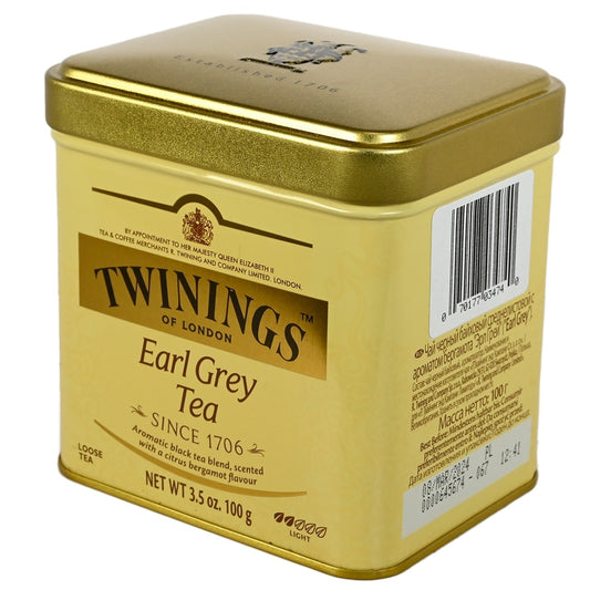 Gold tea tin of Earl Grey Tea with Twinings branding on a white background