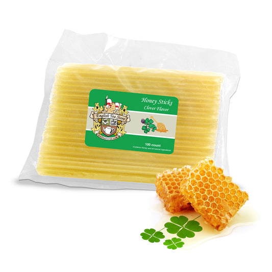Packaged honey sticks with a visible brand label on a white background