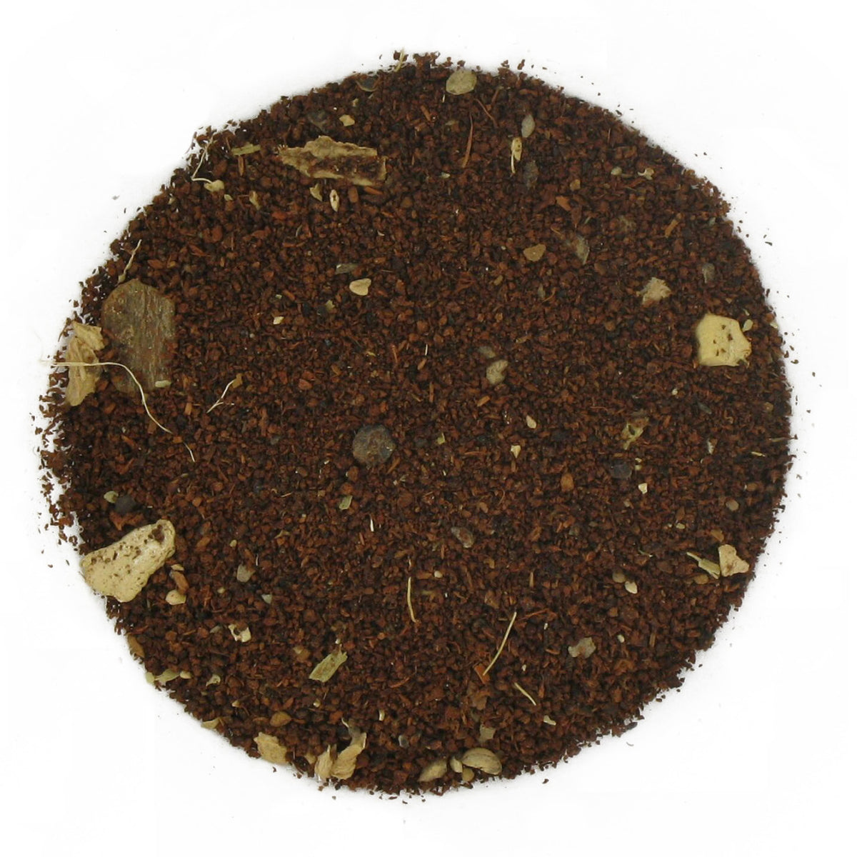 A close-up image of loose leaf decaf chai tea with visible spices integrated throughout.