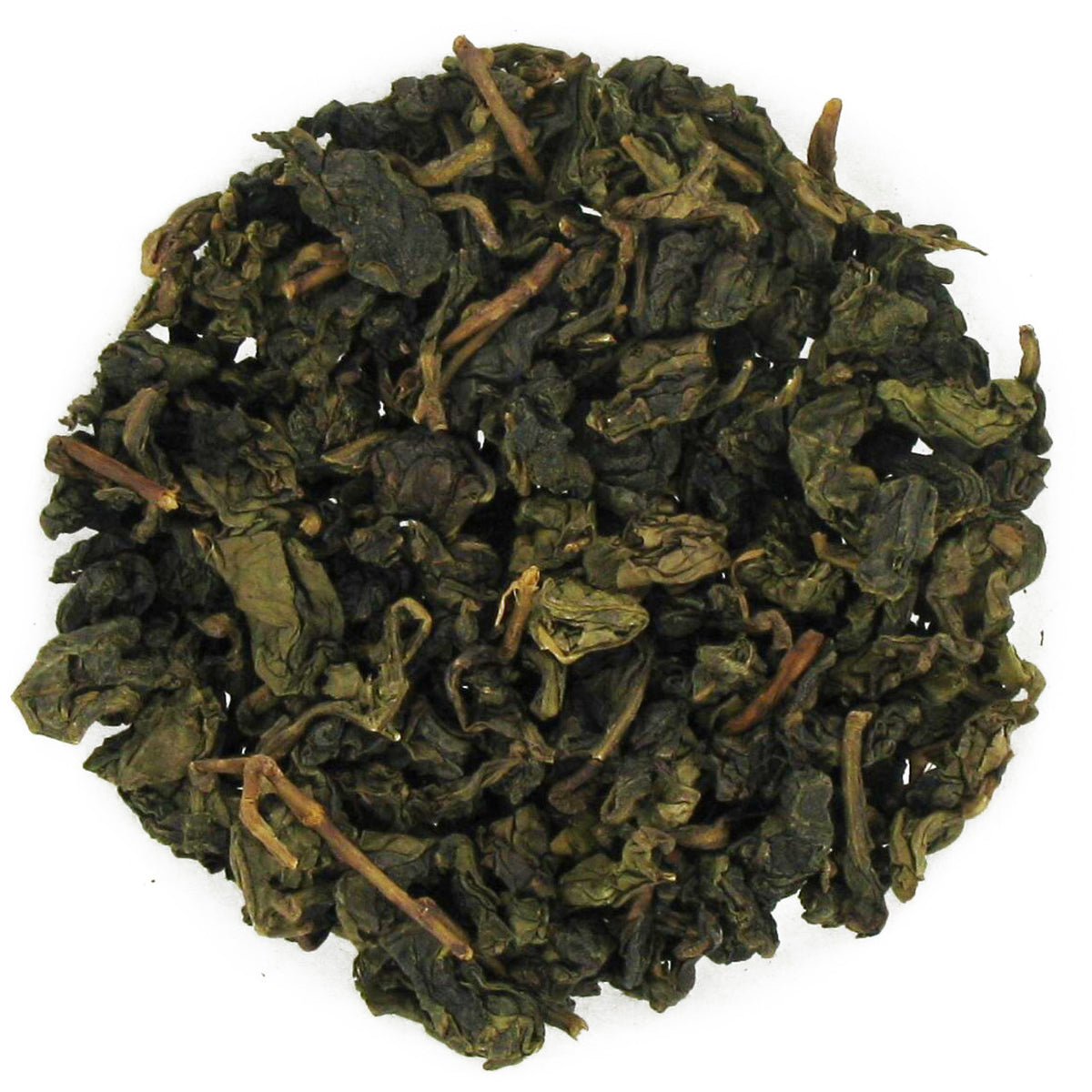 Close-up of green tea leaves on a white background