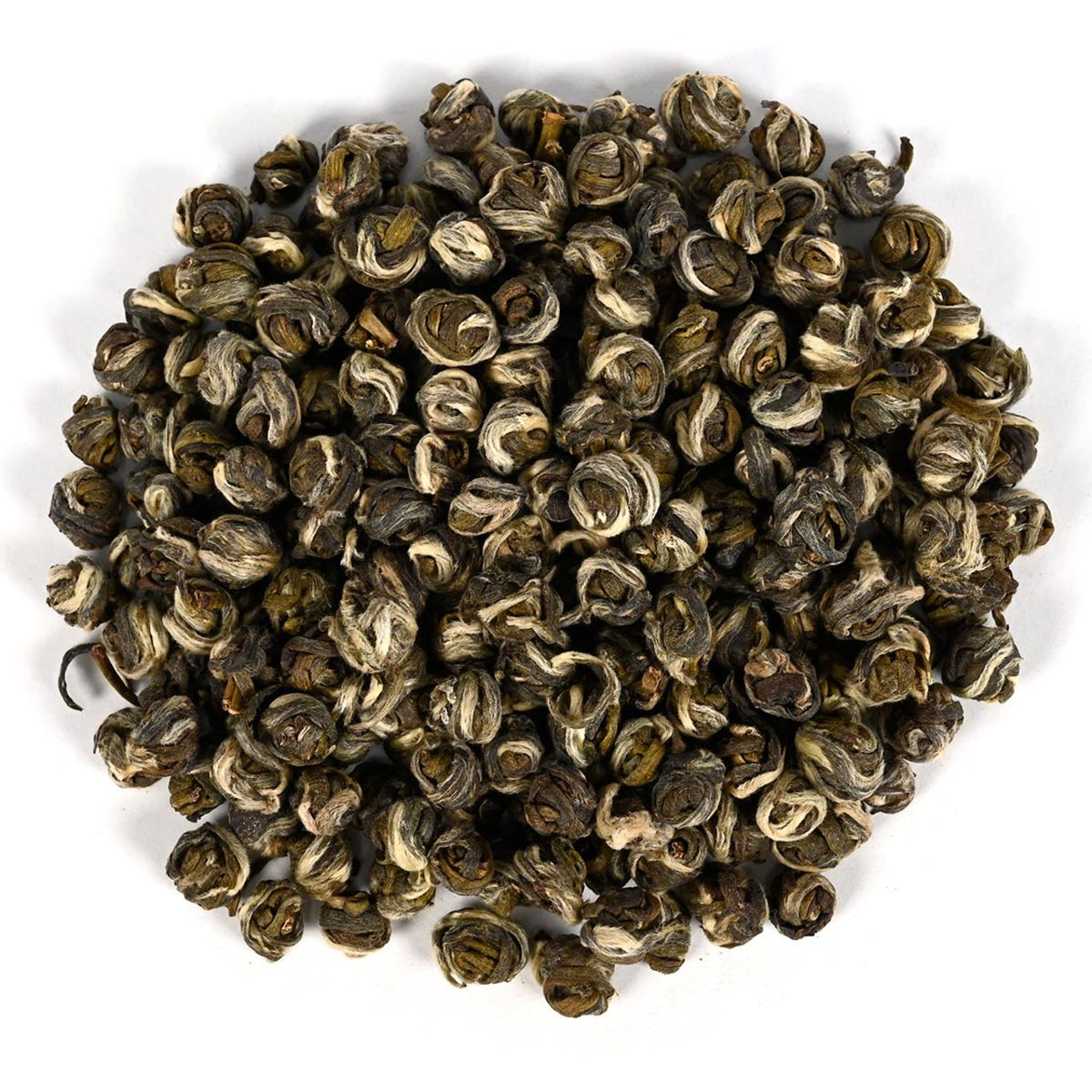 Pile of dried green tea leaves on a white background
