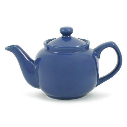 Blue ceramic teapot on a white background