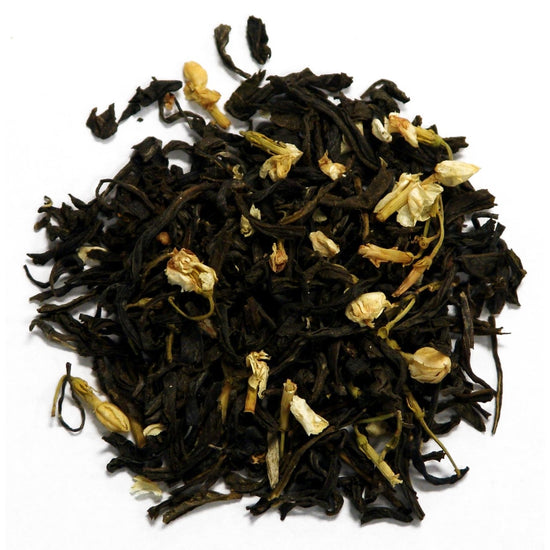 Tea leaves with yellow flowers on a white background