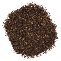 A pile of fine loose leaf Darjeeling tea.