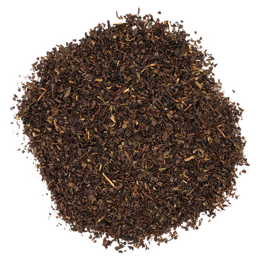 A pile of fine loose leaf Darjeeling tea.