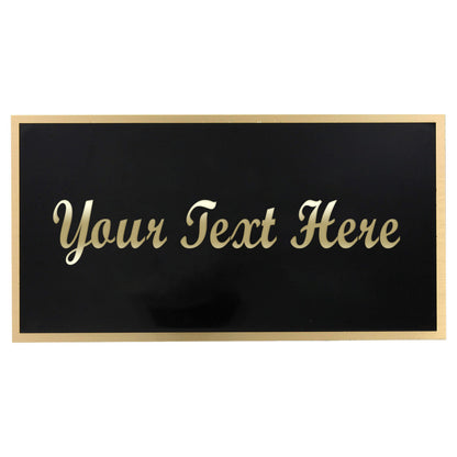 Black engraved plate with gold trim and place holder in cursive for Your text here
