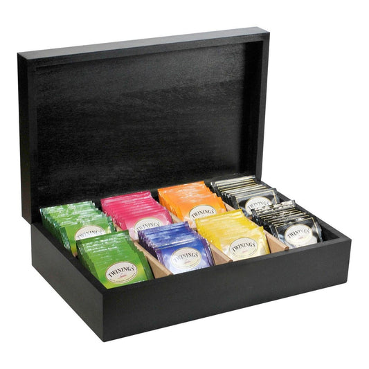 Black wooden tea chest with individually wrapped Twinings teabags on a white background