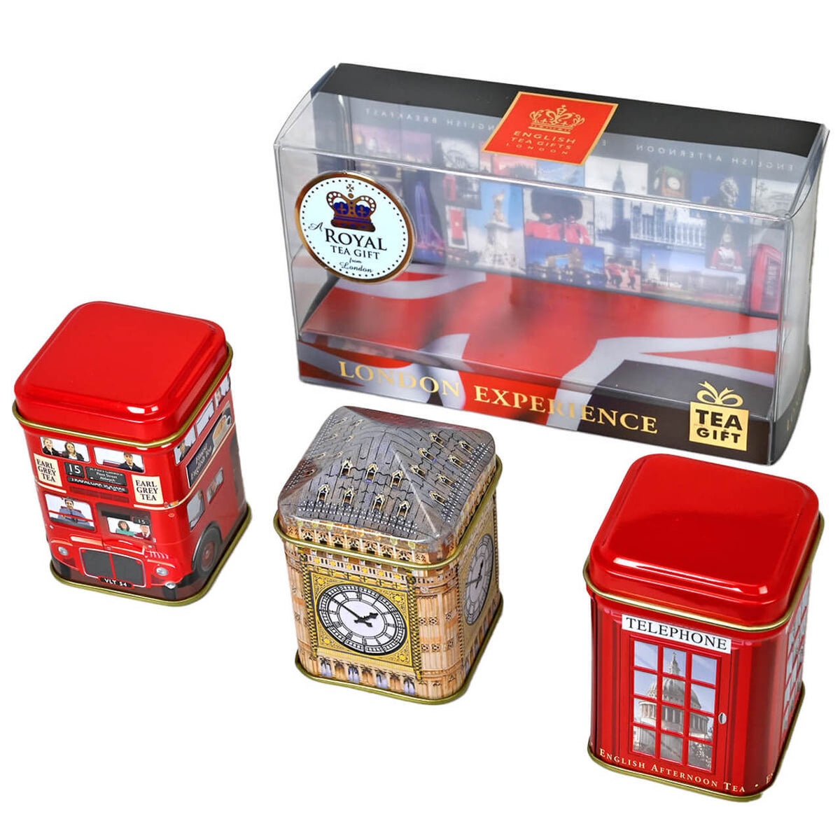 Three tea tins with London-themed designs in front of a plastic package for the tins displaying images of London.