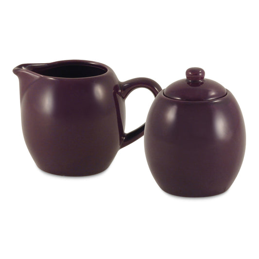 Plum ceramic sugar and creamer tea set on a white background