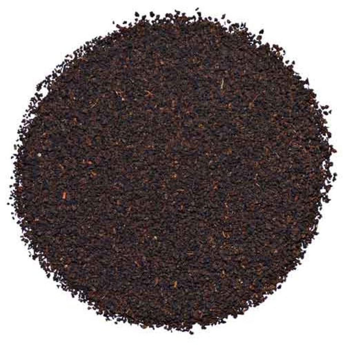 Close-up of dark brown Assam tea on a white background