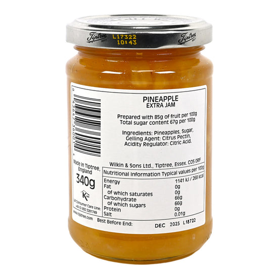 Jar of Wilkin & Sons Pineapple Conserve featuring a label with black print containing nutrition and ingredients.