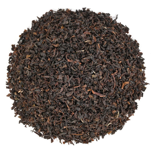 Pile of dry loose-leaf black tea