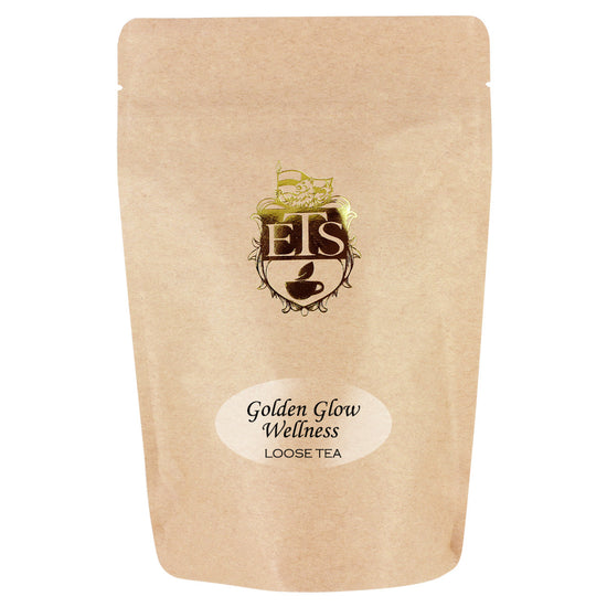 Kraft paper tea bag with 'Golden Glow Wellness' label and ETS logo on a white background