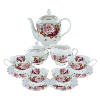 A bone china tea set with a floral pattern, including a teapot, cups, saucers, and decorative plates, predominantly white with blue bands and gold trim.