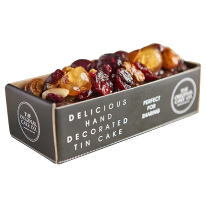 Box of The Original Cake Co.'s Jewel Topped Rich Fruit Cake in a grey open box package with white text.  Product is on a white background.