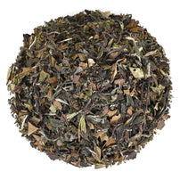Tea leaves on a white background