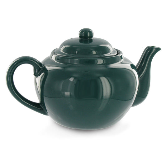 Green teapot on a white background