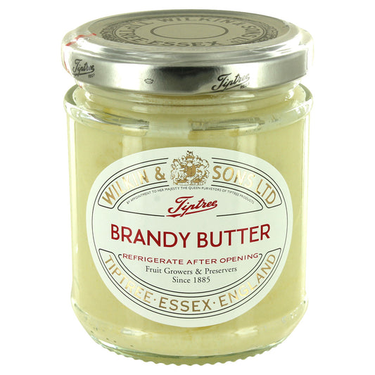 A jar of Tiptree Brandy Butter. The label is predominantly white with red and black text, indicating the brand and product name.
