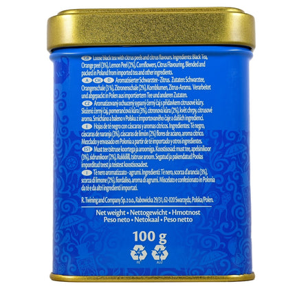 Blue tea canister with gold lid and text on a white background