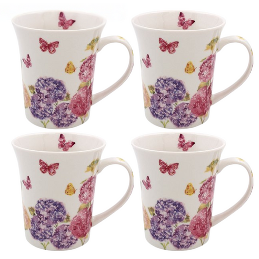 Set of four mugs with floral and butterfly design on a white background